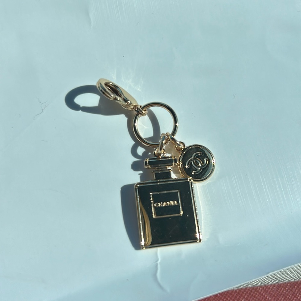 Authentic CHANEL Holiday Double Charm Pendant